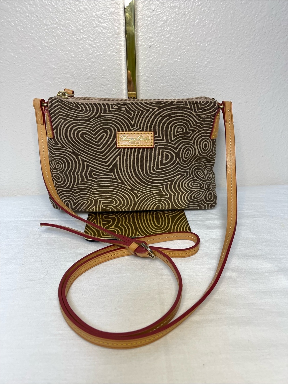Dooney & Bourke Cream and Brown Doodle Swirl Crossbody Bag